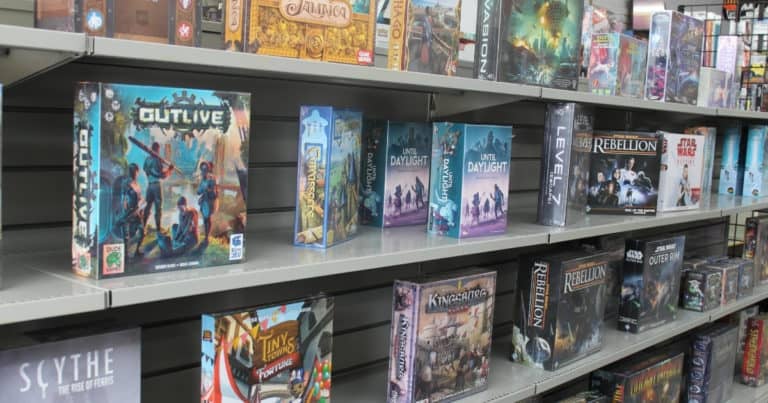 Board games on shelves at Mad Bros